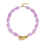 Necklace with asymmetric statement bead
