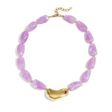 Necklace with asymmetric statement bead