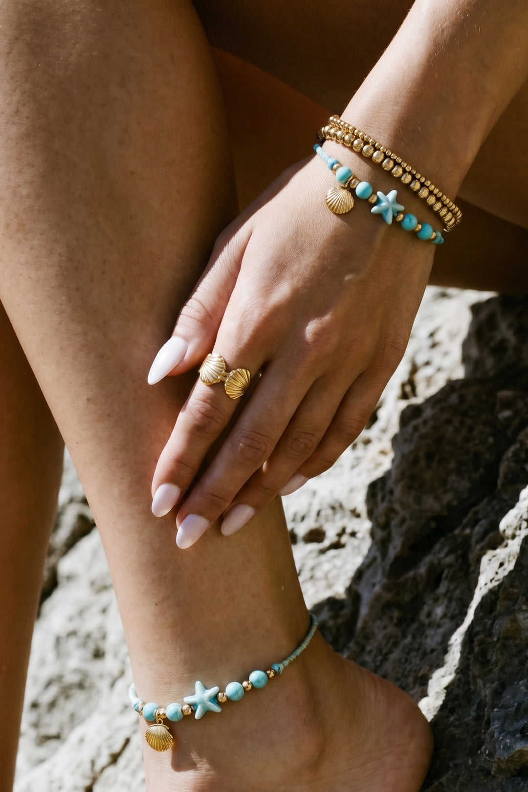 Bracelet with rope-pattern beads, starfish, and shell