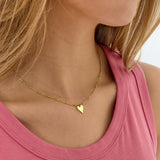 necklace with balls and heart charm
