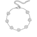 Elegant bracelet with zirconia-set flowers
