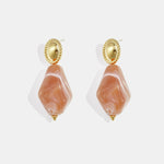Earrings with natural stone look