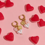 Earrings with flowers and heart pendants