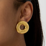 Statement earrings in a donut shape