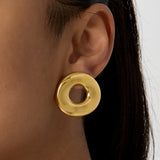 Statement earrings in a donut shape