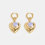 Hoop earrings with heart pendant and bead on ring
