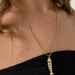 Necklace with moving fish charm