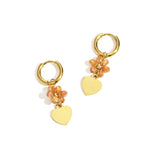 Earrings with heart on beaded flower