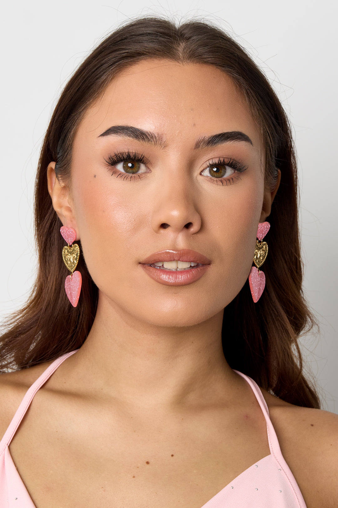 Statement earrings with glitter hearts