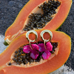Round earrings with hanging flower
