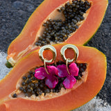 Round earrings with hanging flower