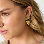 Bow earrings with hanging heart