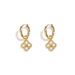 Small hoop earrings with zirconia-set clover charm