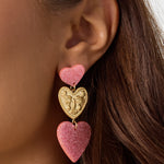 Statement earrings with glitter hearts