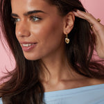 Earrings with heart charm and pearl