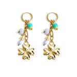 Small hoop earrings with hanging clover, beads and leaves