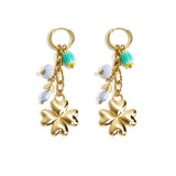 Small hoop earrings with hanging clover, beads and leaves