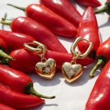 Squoval earrings with heart pendant and stone