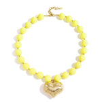 Bead necklace with hanging heart