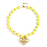 Bead necklace with hanging heart