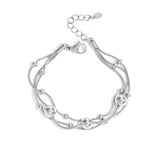 Bracelet with chains and polka dots