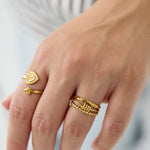 Layered ring with minimalist twisted detail