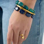 Beaded bracelet with oval and gold beads