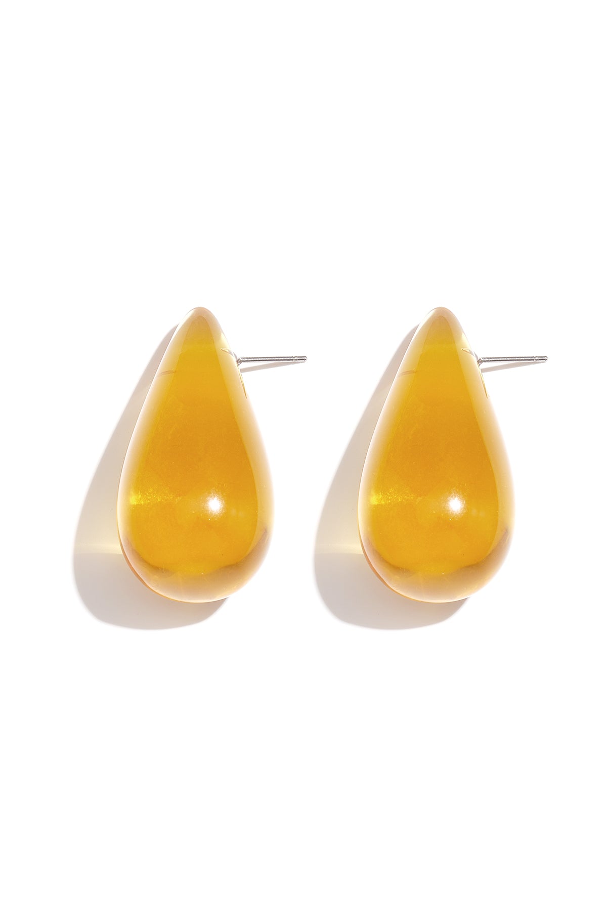 Earrings with teardrop-shaped resin studs