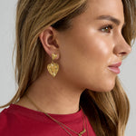 Earrings with heart-shaped pendants