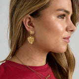 Earrings with heart-shaped pendants