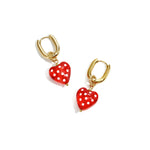 Earrings with dangling hearts with dots