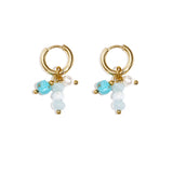 Earrings with hanging beads