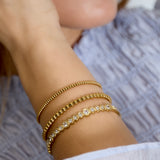 Bangle bracelet round stones