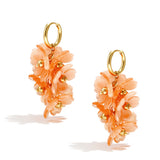 Earrings with a hanging wreath of flowers