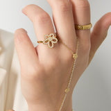 Ring with inlaid flower