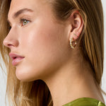 Earrings with alternating stones