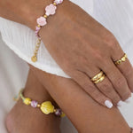 Bracelet with tortoise and shell beads and rope motif