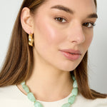 Necklace with asymmetric statement bead