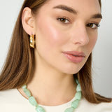 Necklace with asymmetric statement bead