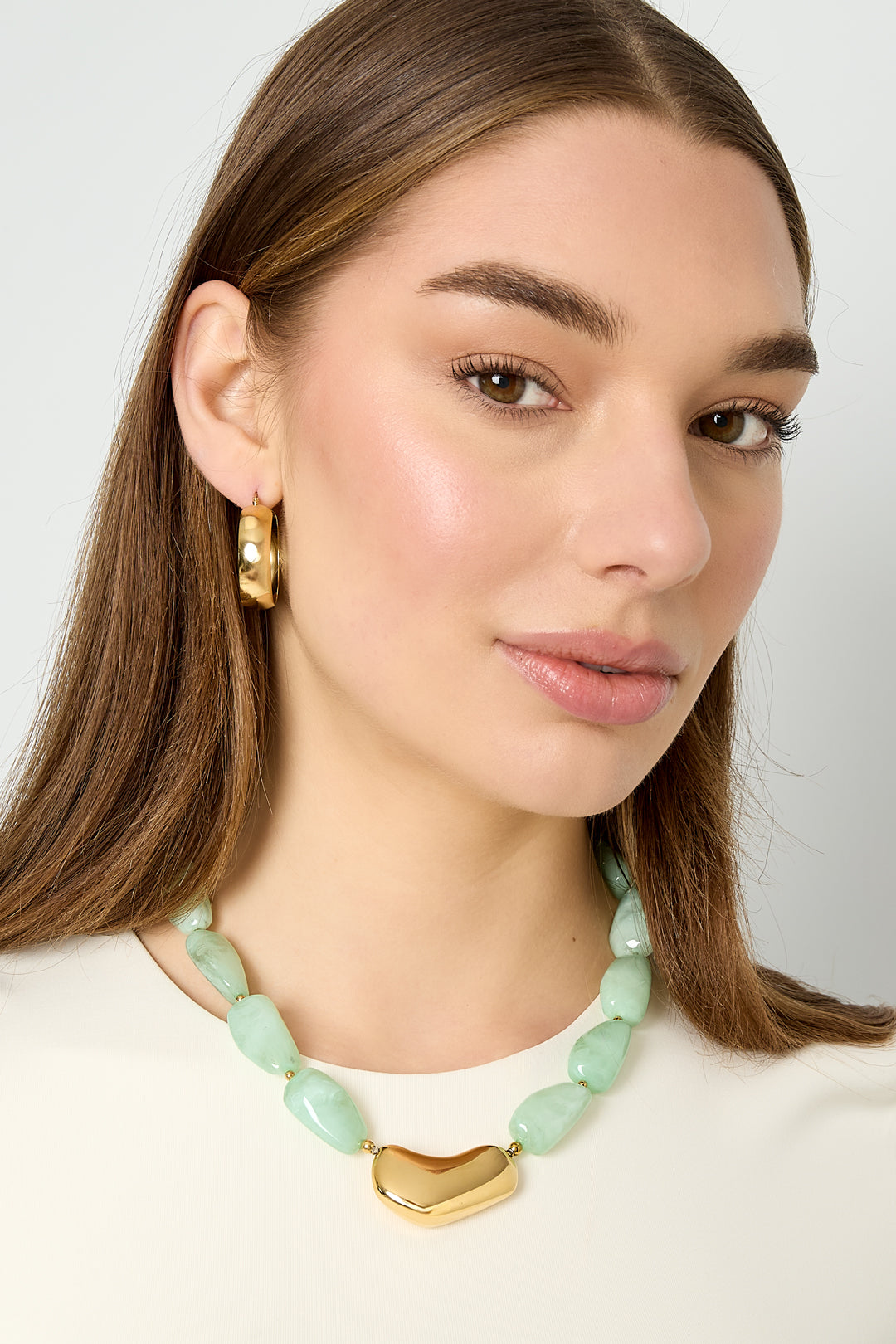 Necklace with asymmetric statement bead