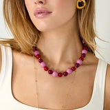 Necklace with beads of different sizes