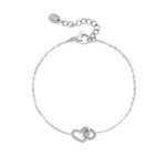 Bracelet with connected heart charm