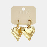 Earrings with large hanging heart