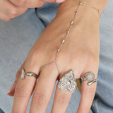 Hand chain with beads and rectangular stones