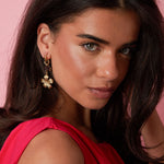 Earrings with flower pendants in various sizes