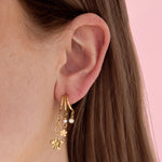 Triple earrings with floral pendants