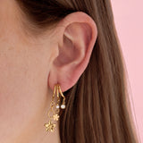 Triple earrings with floral pendants