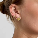 Heart-shaped stud earrings with set edges