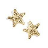 Dented star earrings