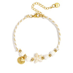 Bracelet with rope-pattern beads, starfish, and shell